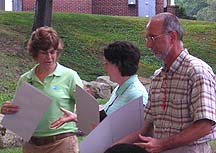 Jan Rybka presents the Roger Biemel Memorial award to  Kim Swaggard-Svec and James Gazda